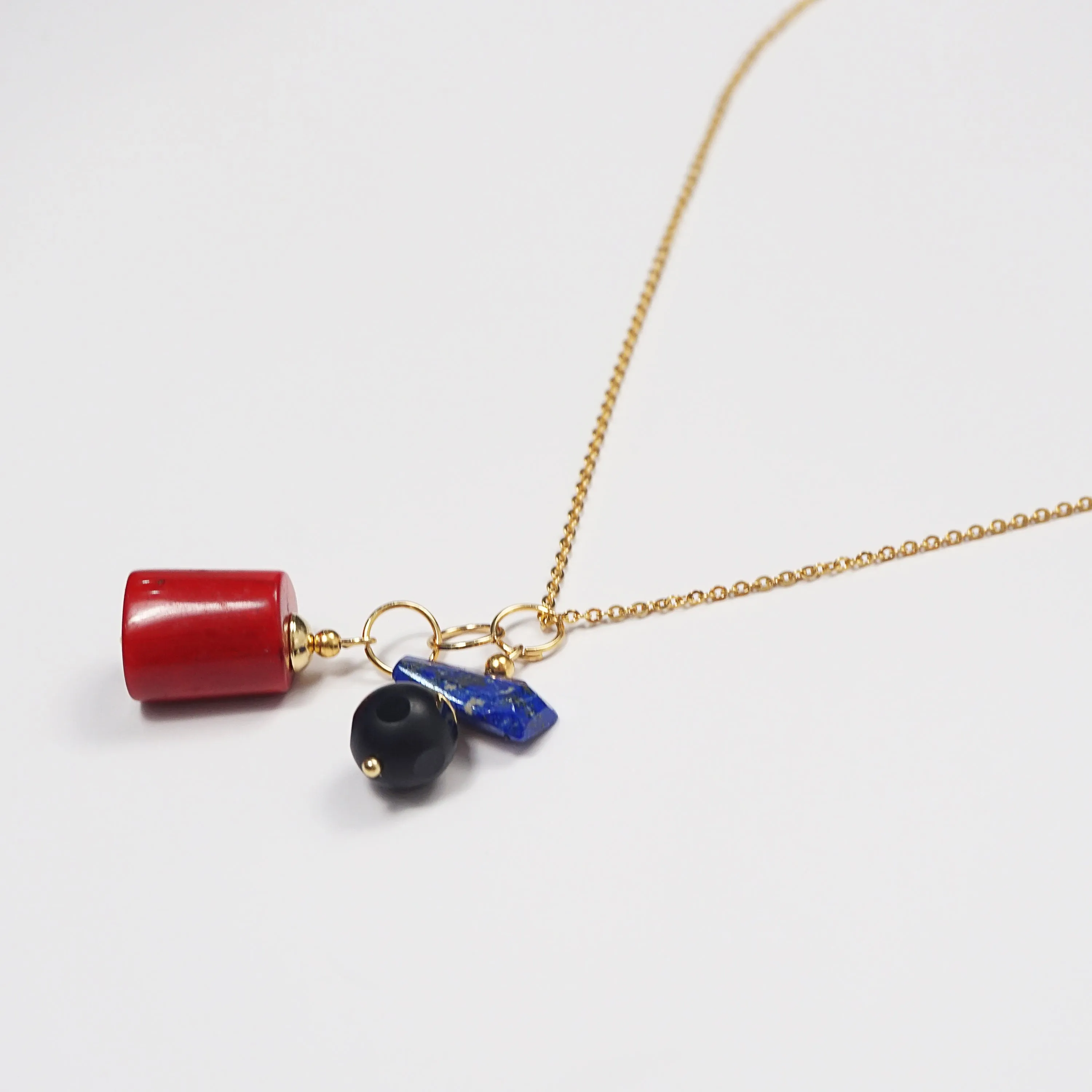 Red Coral, Lapis Lazuli, and Black Onyx